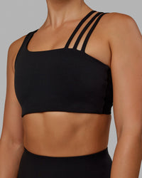 Woman wearing Galvanise Sports Bra - Black | Thumbnail Index: 7