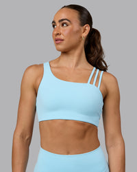 Woman wearing Galvanise Sports Bra - Crystal Blue | Thumbnail Index: 1