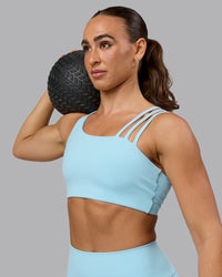 Woman wearing Galvanise Sports Bra - Crystal Blue | Thumbnail Index: 4