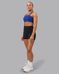 Woman wearing Galvanise Sports Bra - Power Cobalt | Thumbnail Index: 4