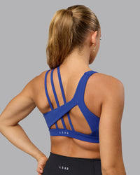 Woman wearing Galvanise Sports Bra - Power Cobalt | Thumbnail Index: 5
