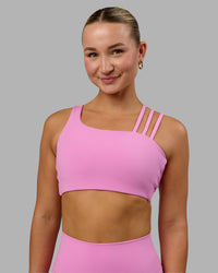 Woman wearing Galvanise Sports Bra - Spark Pink | Thumbnail Index: 1