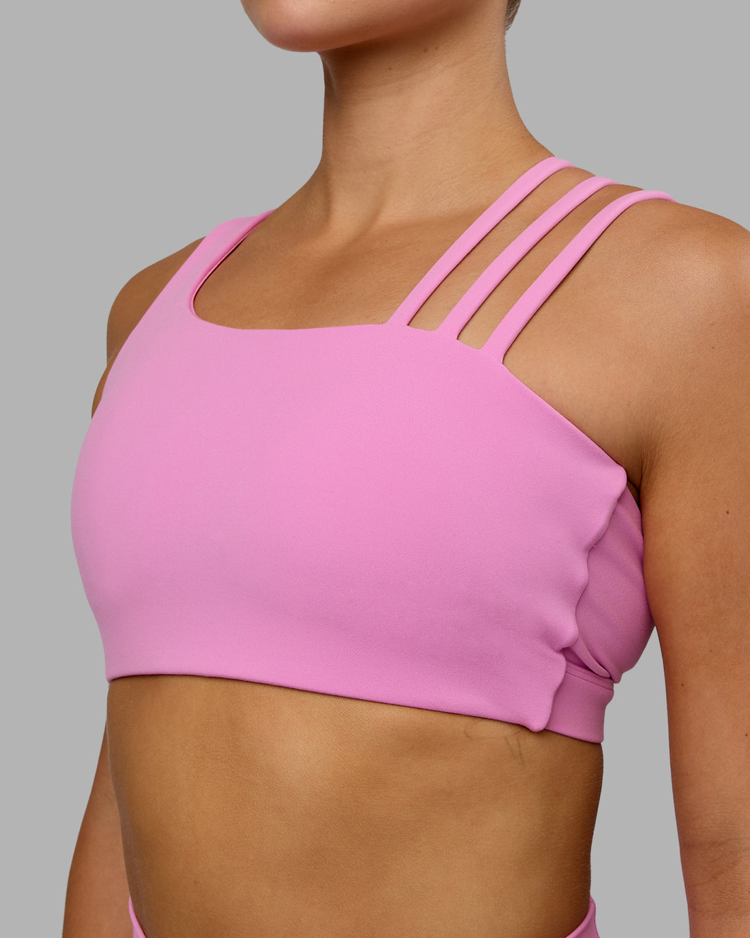Woman wearing Galvanise Sports Bra - Spark Pink - view 7