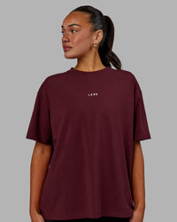 Woman wearing Go-To FLXCotton Oversized Tee - Dark Cherry | Thumbnail Index: 1