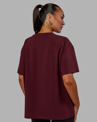 Woman wearing Go-To FLXCotton Oversized Tee - Dark Cherry | Thumbnail Index: 3