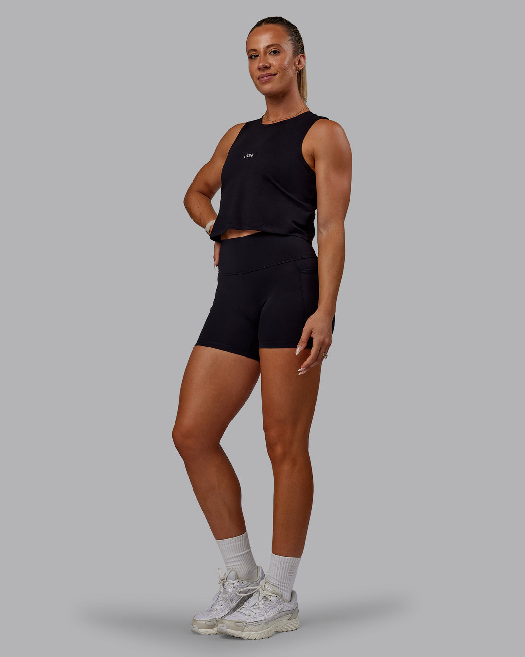 Woman wearing Go-To FLXCotton Tank - Black-White - view 5