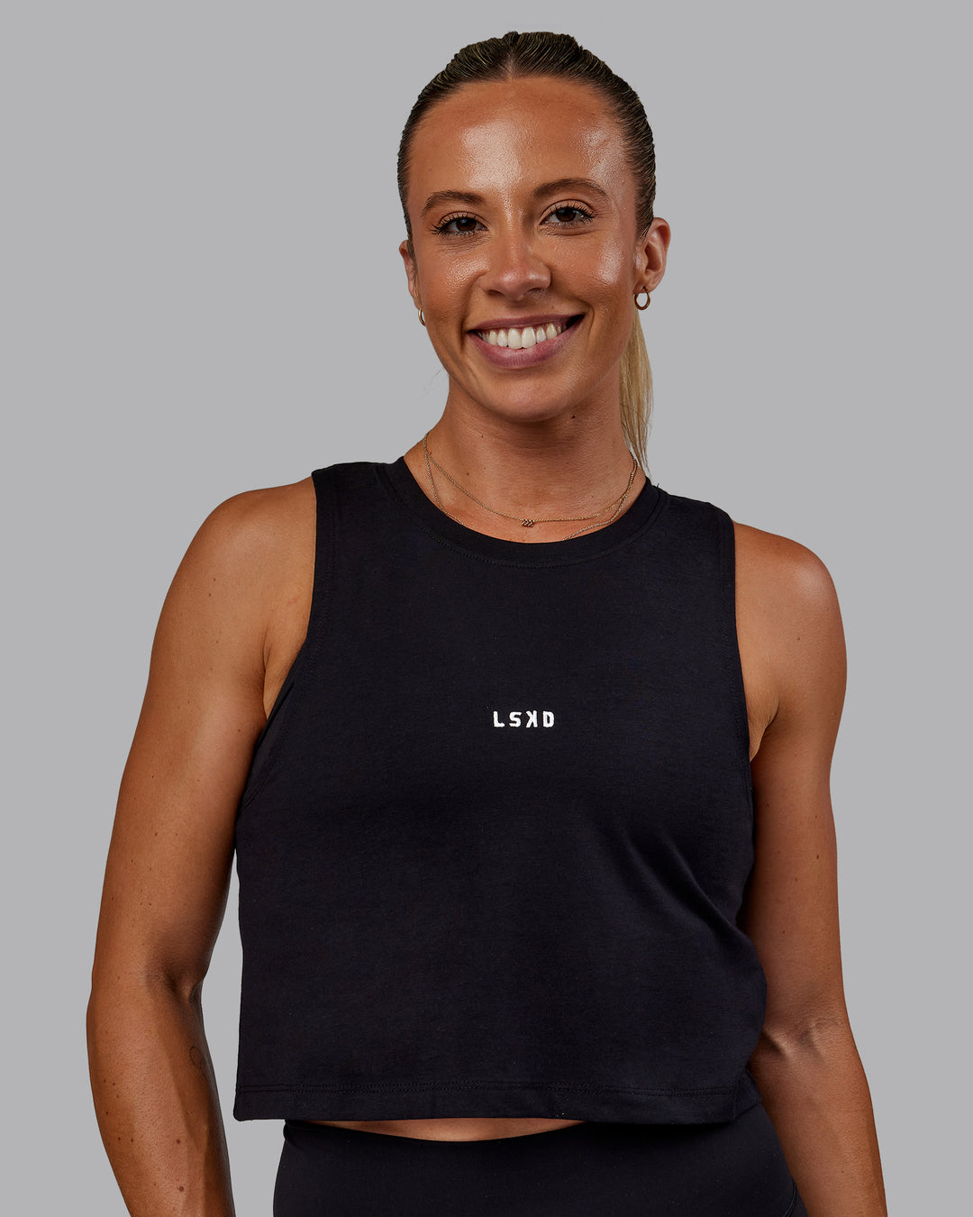 Woman wearing Go-To FLXCotton Tank - Black-White - view 1