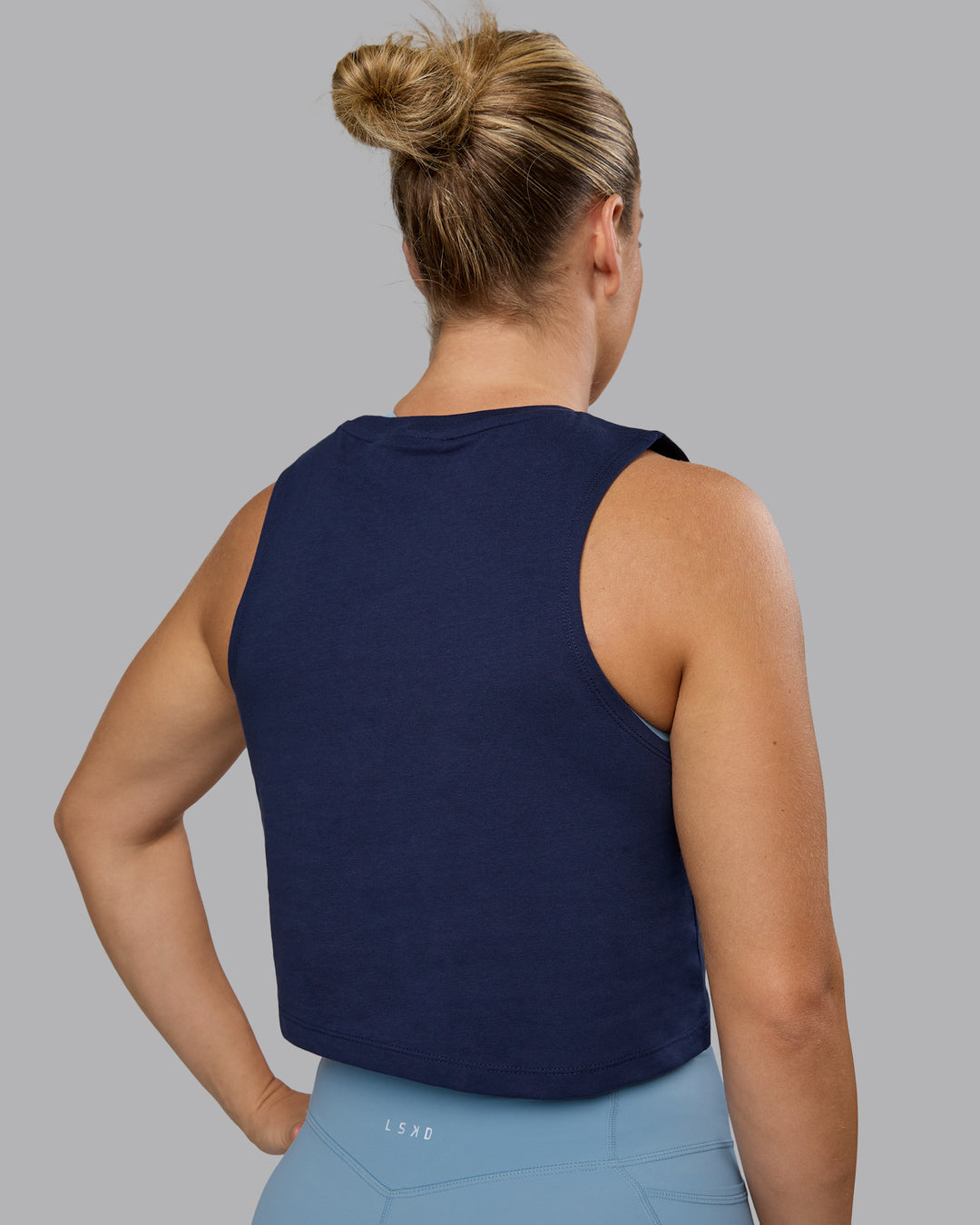 Woman wearing Go-To FLXCotton Tank - Future Navy-White - view 3