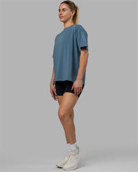 Woman wearing Go-To FLXCotton Oversized Tee - Elemental Blue-White | Thumbnail Index: 2