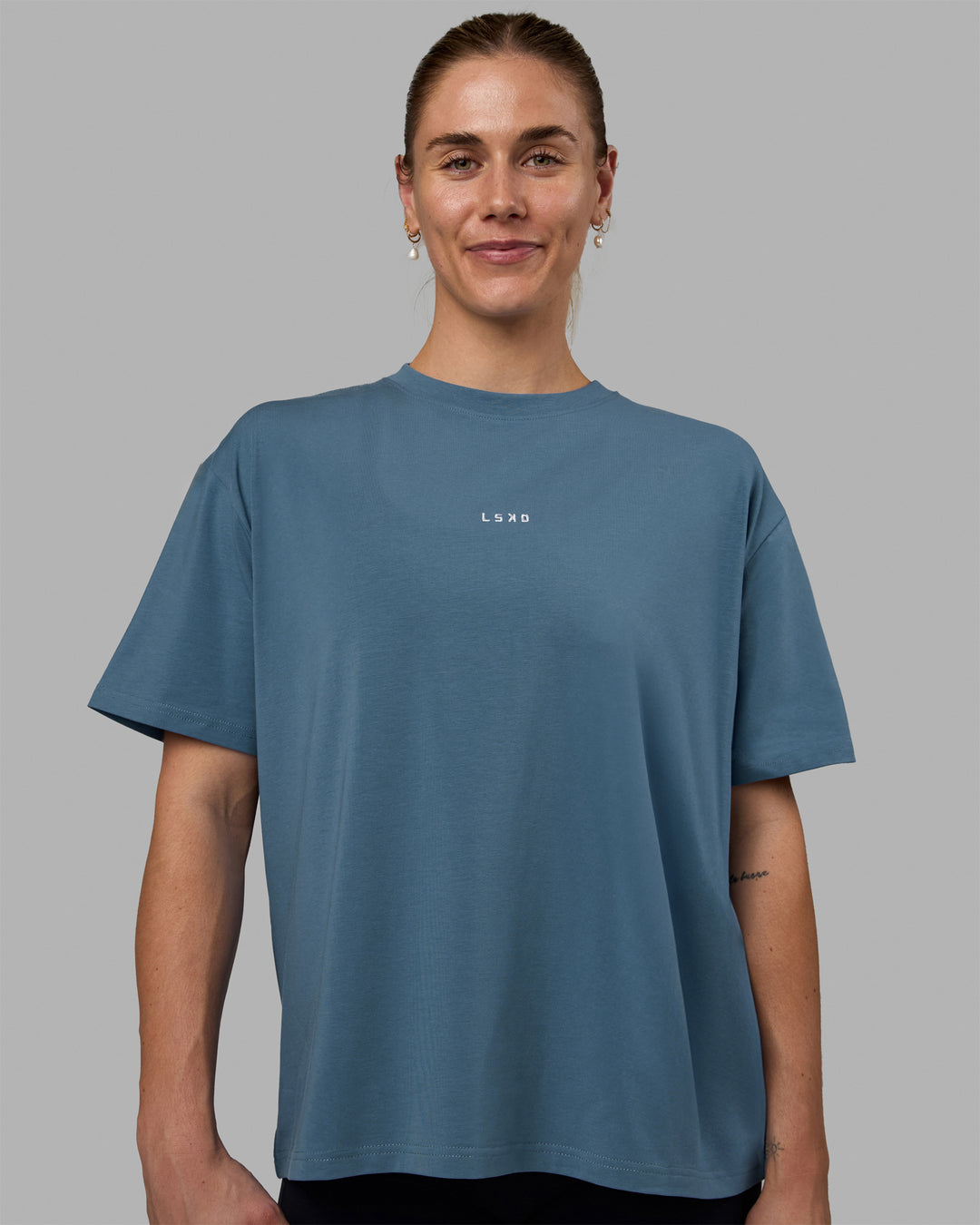 Woman wearing Go-To FLXCotton Oversized Tee - Elemental Blue-White - view 2