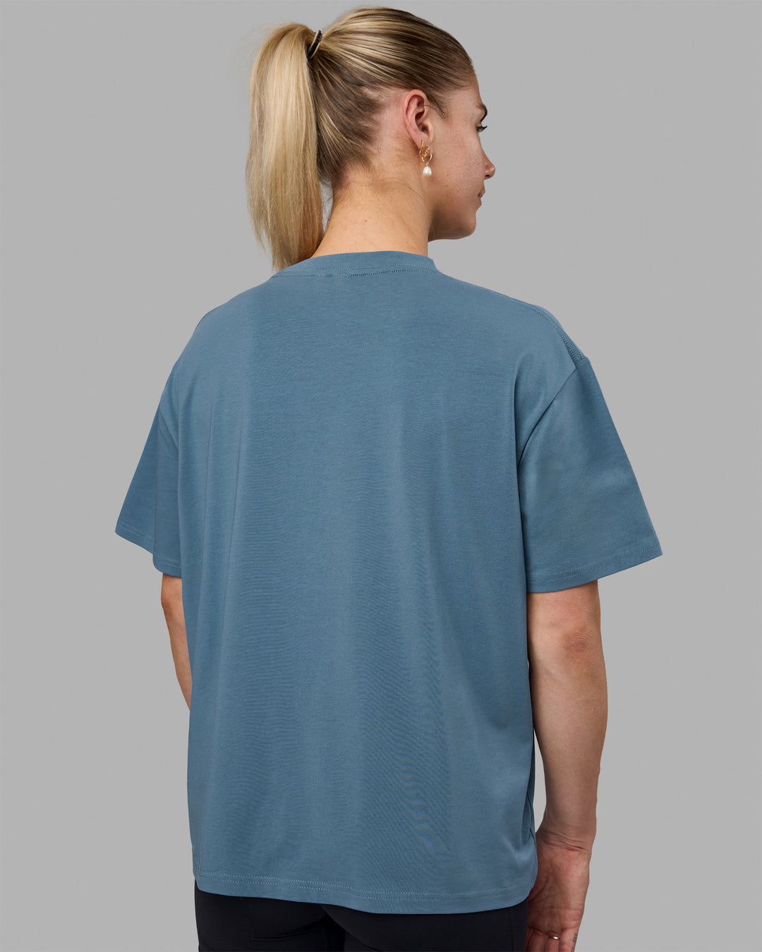 Woman wearing Go-To FLXCotton Oversized Tee - Elemental Blue-White - view 4