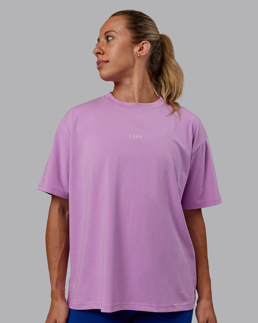 Woman wearing Go-To FLXCotton Oversized Tee - Light Violet-White - view 1