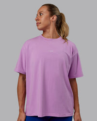 Woman wearing Go-To FLXCotton Oversized Tee - Light Violet-White | Thumbnail Index: 0