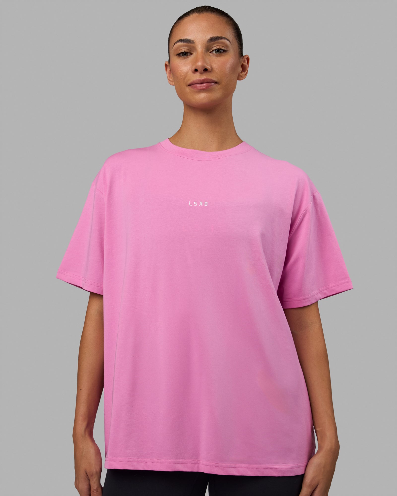 Woman wearing Go-To FLXCotton Oversized Tee - Spark Pink-White