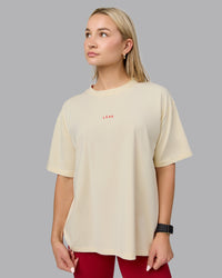 Woman wearing Go-To FLXCotton Oversized Tee - Ivory-Cherry Red | Thumbnail Index: 0