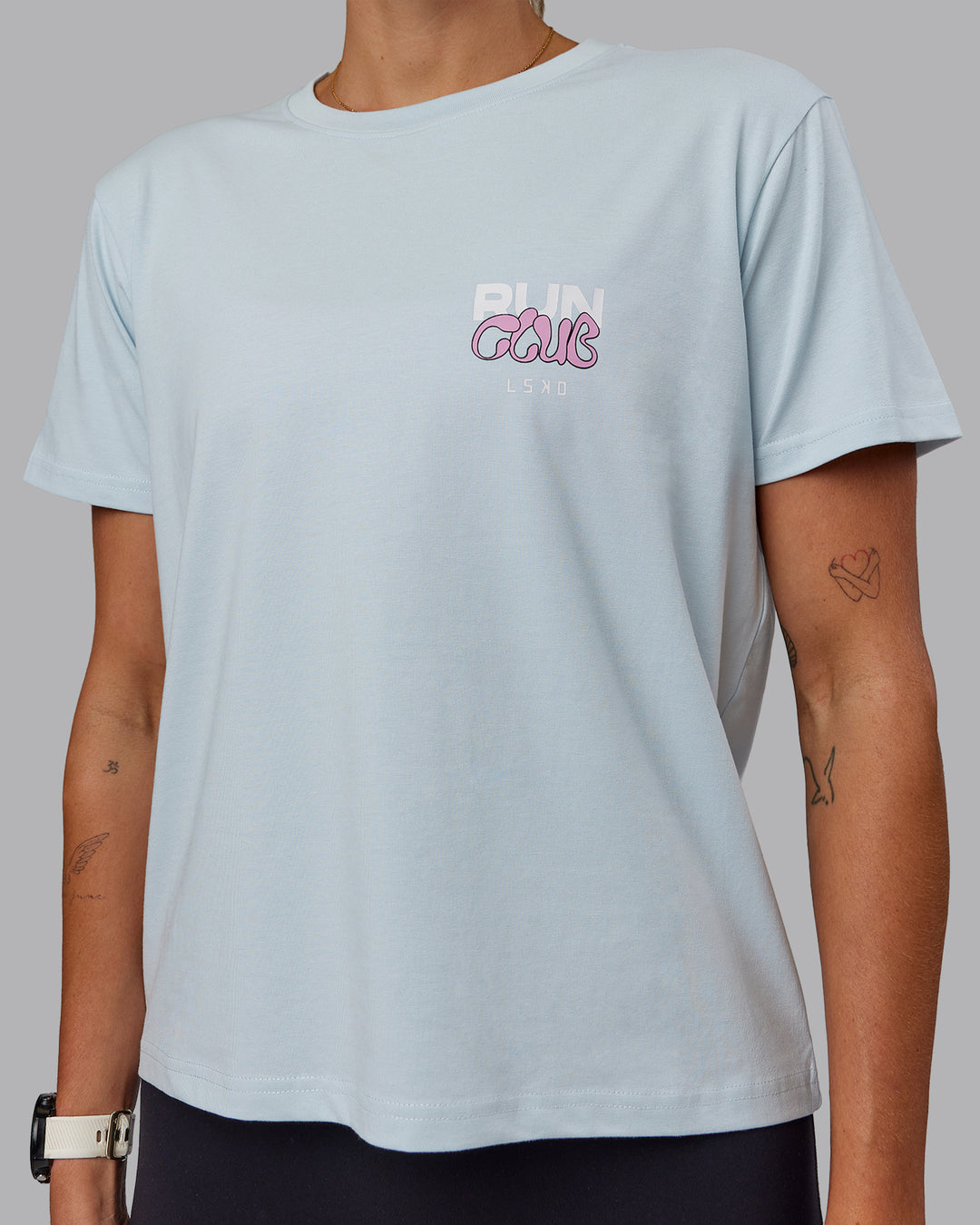 Woman wearing Gone Running FLXCotton Tee - Skyride-Bubblegum - view 4