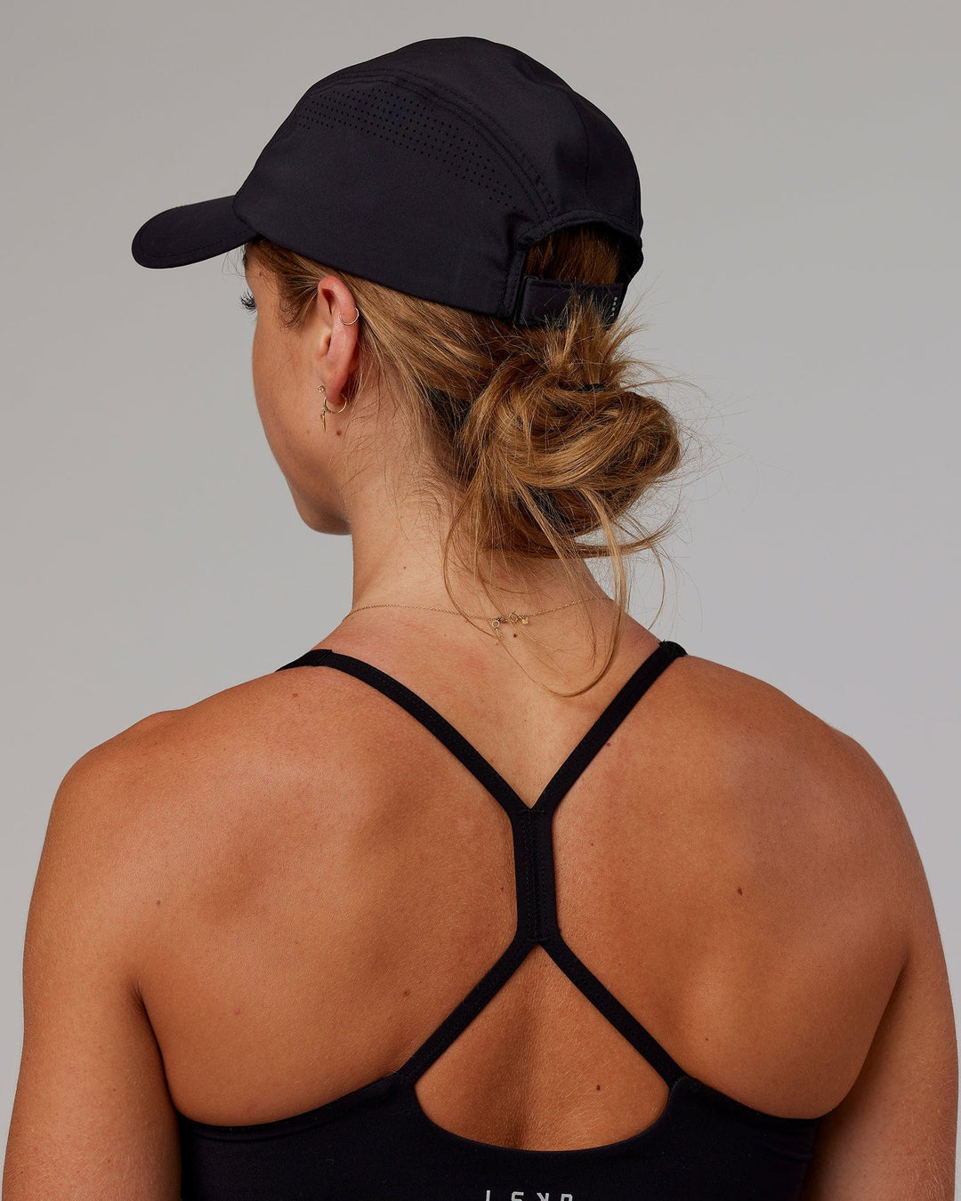 Woman wearing Hybrid Performance Cap - Black - view 9
