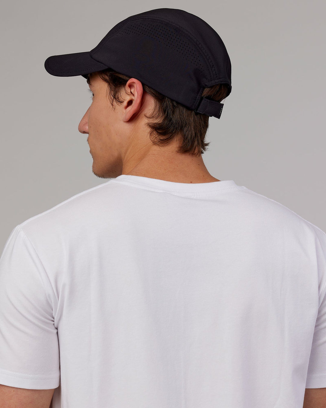 Man wearing Hybrid Performance Cap - Black - view 3