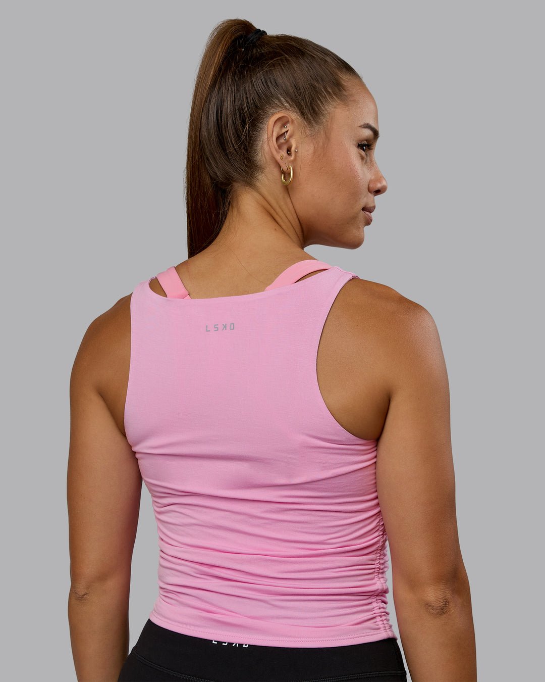 Woman wearing Ignite Scrunch Side Tank - Bubblegum - view 3