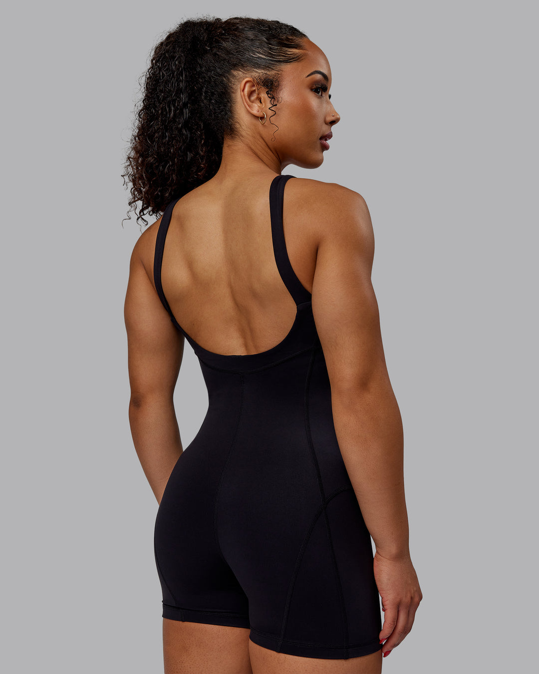 Woman wearing Inertia Bodysuit - Black - view 2