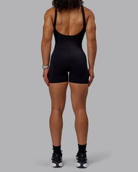 Woman wearing Inertia Bodysuit - Black | Thumbnail Index: 6