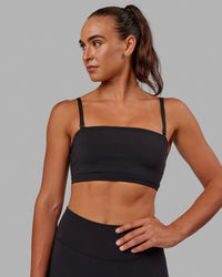 Woman wearing Inspire Sports Bra - Black | Thumbnail Index: 2