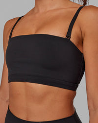 Woman wearing Inspire Sports Bra - Black | Thumbnail Index: 6