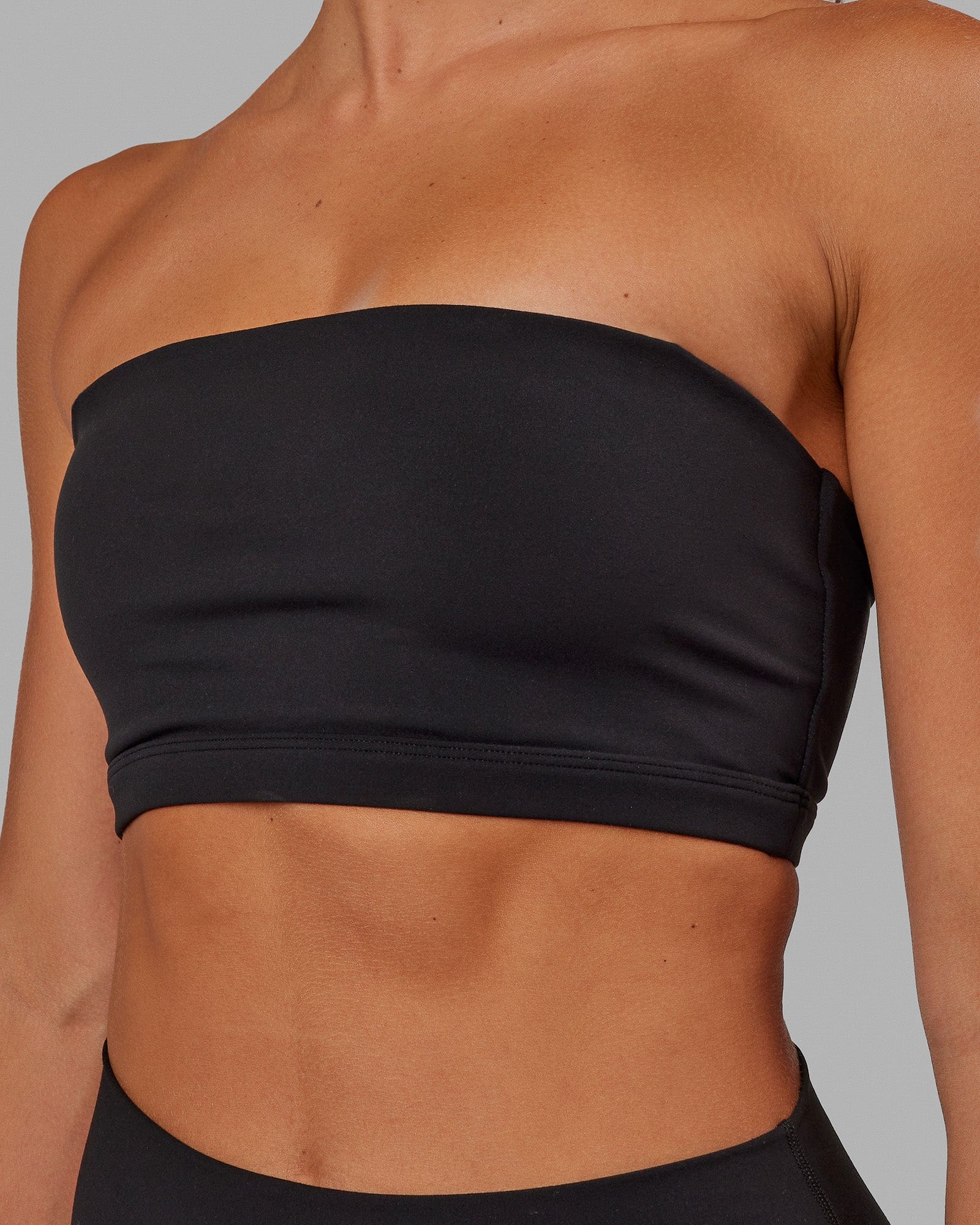 Woman wearing Inspire Sports Bra - Black