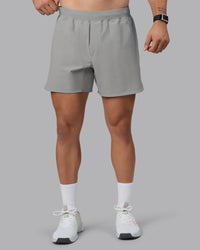 Man wearing Lift 6" Lined Performance Shorts - Circular Grey | Thumbnail Index: 0