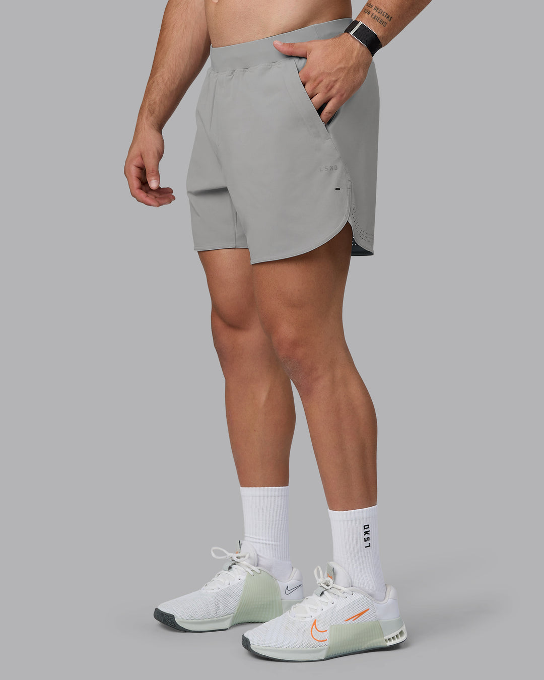 Man wearing Lift 6" Lined Performance Shorts - Circular Grey - view 9