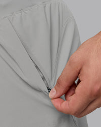 Man wearing Lift 6" Lined Performance Shorts - Circular Grey | Thumbnail Index: 6