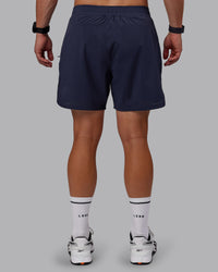 Man wearing Lift 6" Lined Performance Shorts - Future Navy | Thumbnail Index: 3