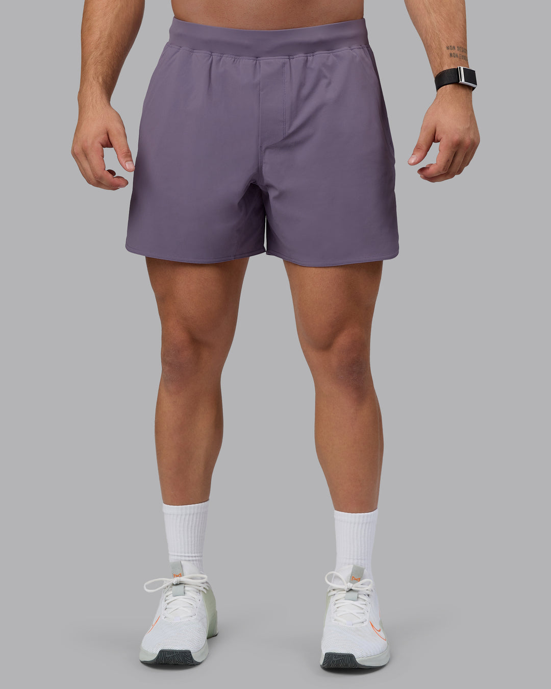 Man wearing Lift 6" Lined Performance Shorts - Purple Sage - view 9