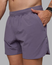 Man wearing Lift 6" Lined Performance Shorts - Purple Sage | Thumbnail Index: 4