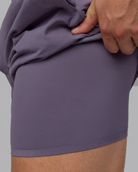 Man wearing Lift 6" Lined Performance Shorts - Purple Sage | Thumbnail Index: 1