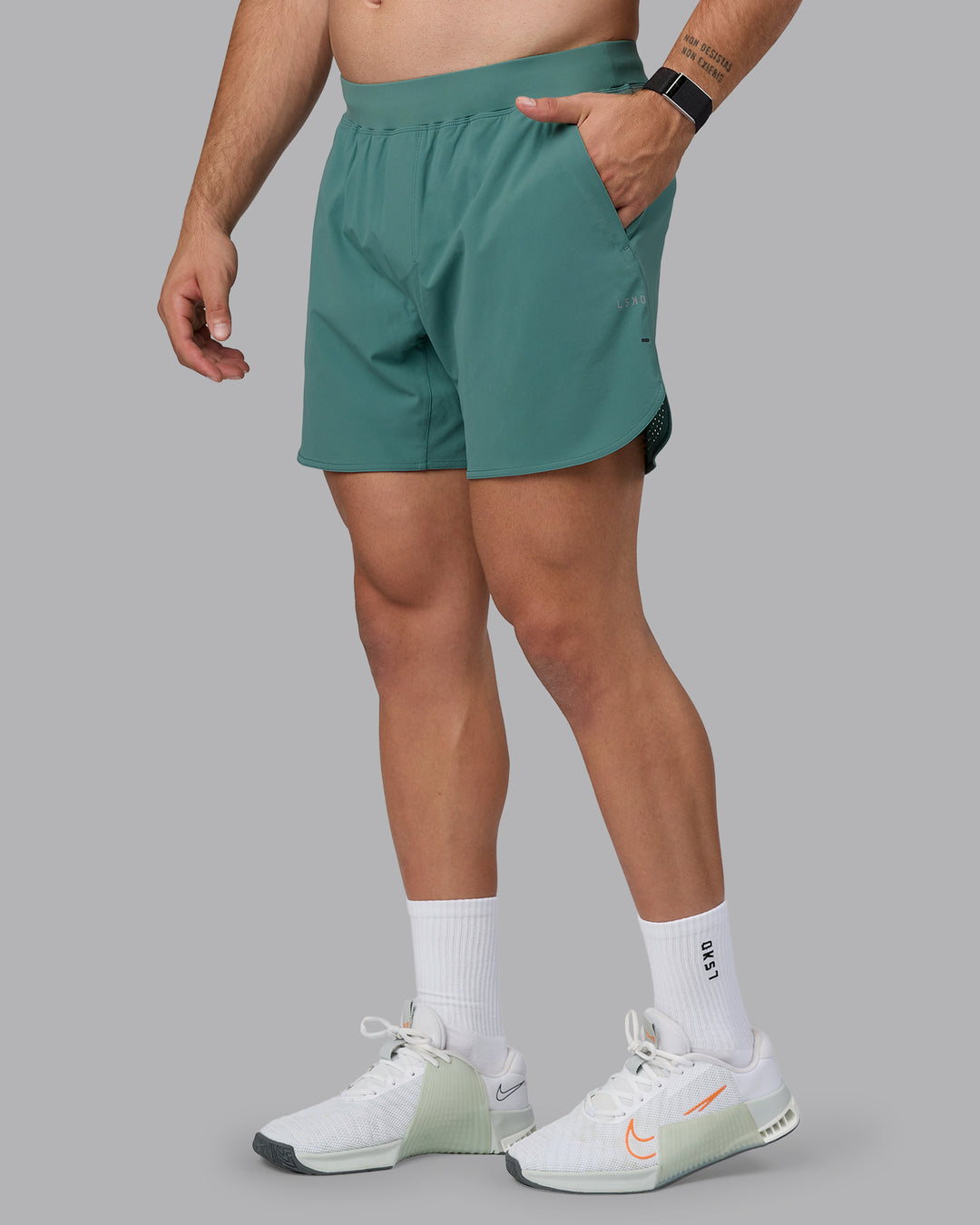 Man wearing Lift 6" Lined Performance Shorts - Sagebrush - view 9