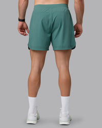 Man wearing Lift 6" Lined Performance Shorts - Sagebrush | Thumbnail Index: 4