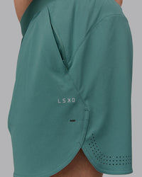 Man wearing Lift 6" Lined Performance Shorts - Sagebrush | Thumbnail Index: 7