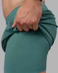 Man wearing Lift 6" Lined Performance Shorts - Sagebrush | Thumbnail Index: 1