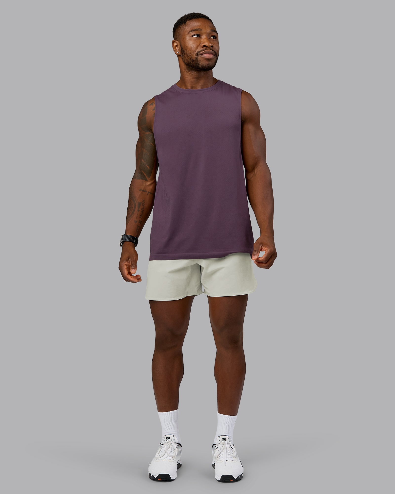 Man wearing Lift 6" Performance Short - Bone | Model:Sam | Size:L