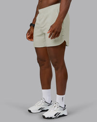 Man wearing Lift 6" Performance Short - Bone | Model:Sam | Size:L | Thumbnail Index: 6