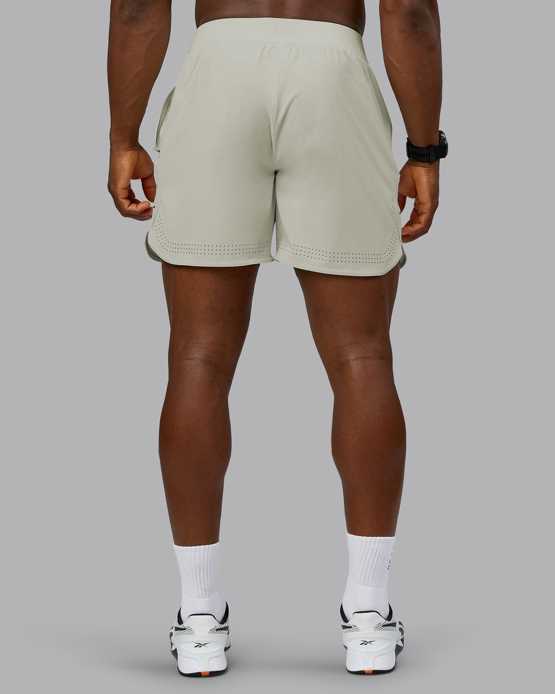 Man wearing Lift 6" Performance Short - Bone | Model:Sam | Size:L - view 4