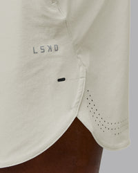 Man wearing Lift 6" Performance Short - Bone | Model:Sam | Size:L | Thumbnail Index: 7