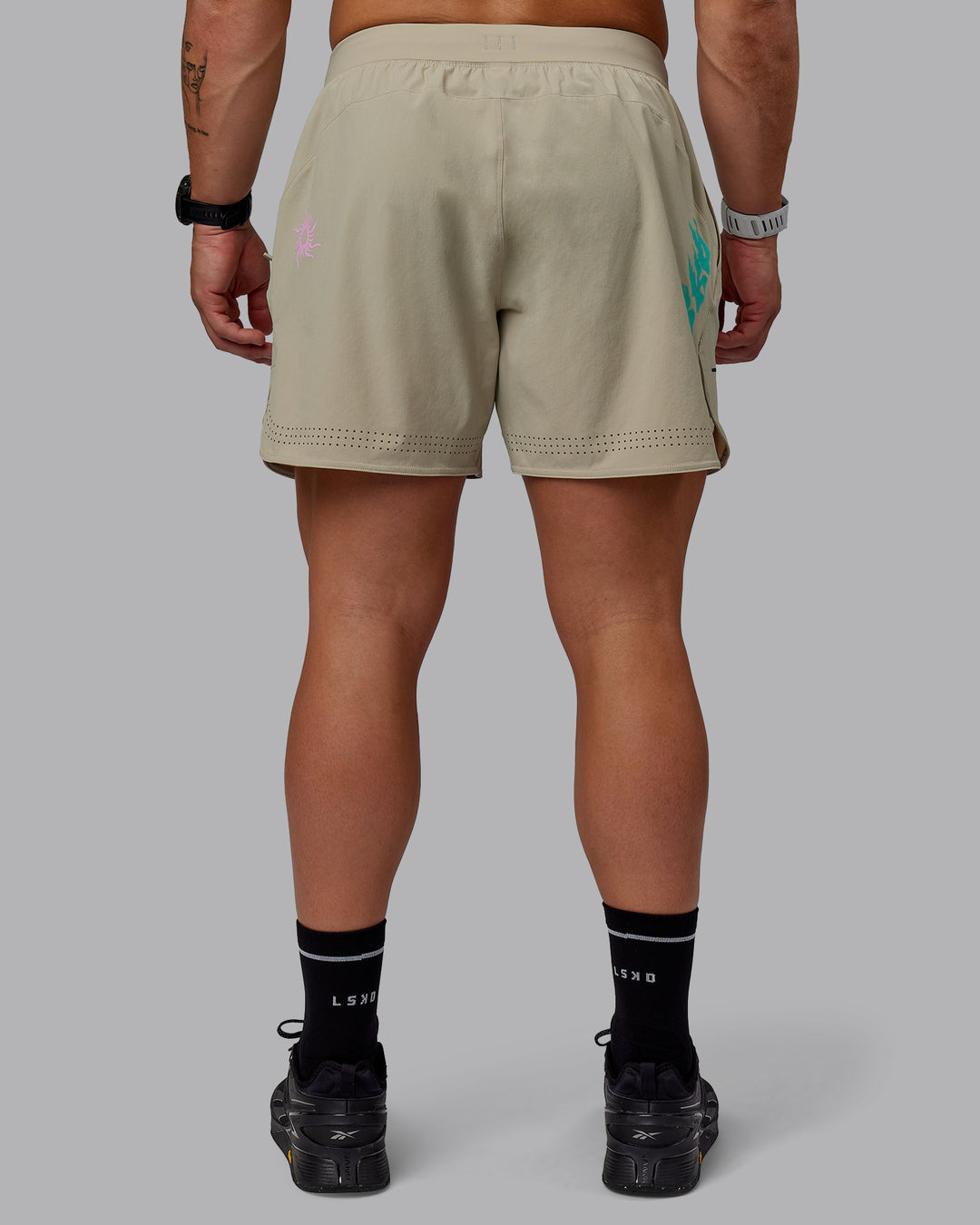 Man wearing Lift 6" Performance Shorts - Sand-So Cal 24 - view 7