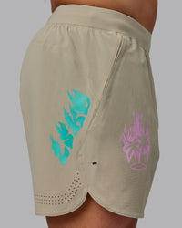 Man wearing Lift 6" Performance Shorts - Sand-So Cal 24 | Thumbnail Index: 4