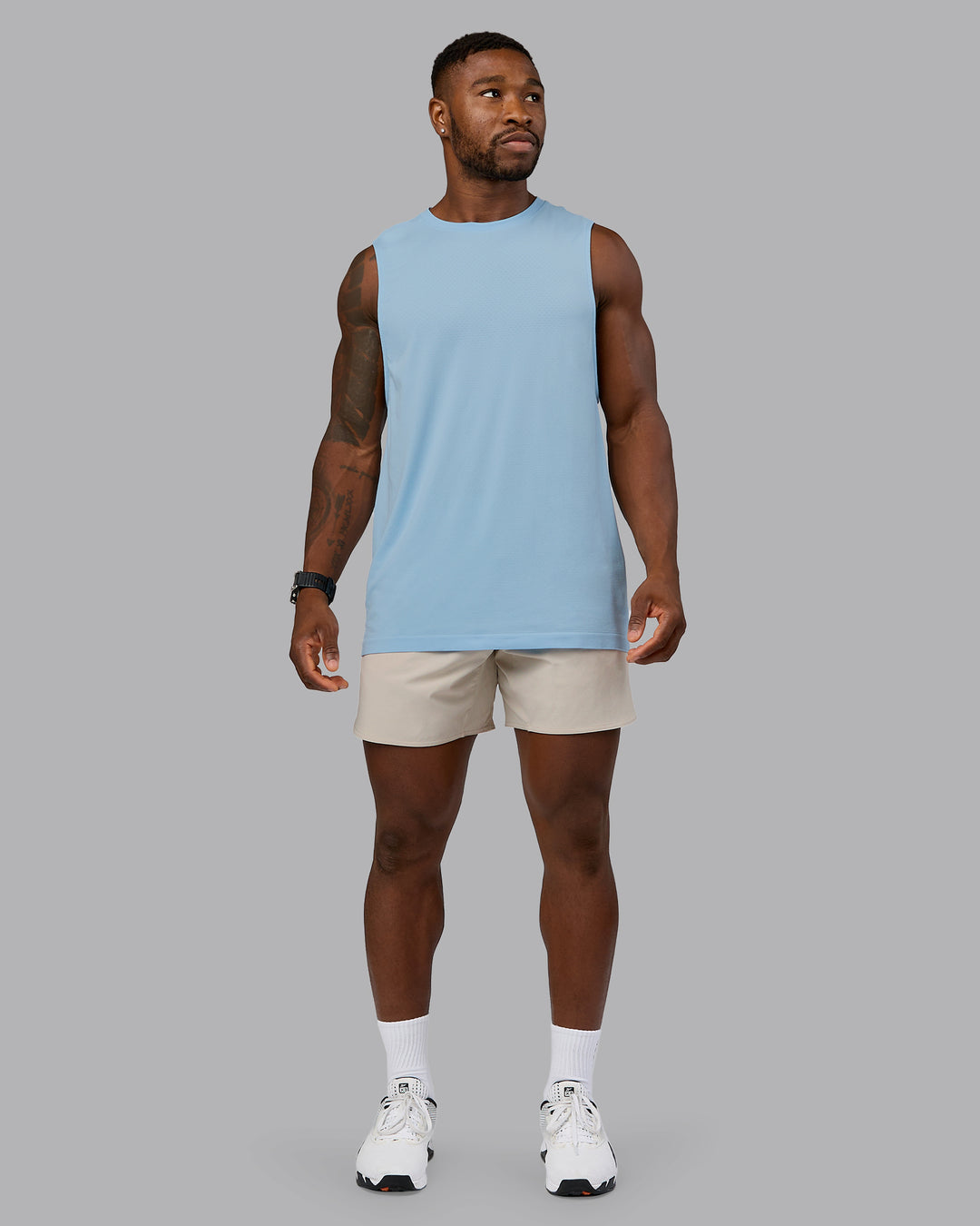 Man wearing Lift 6" Performance Short - Shale-Beige | Model:Sam | Size:L - view 3