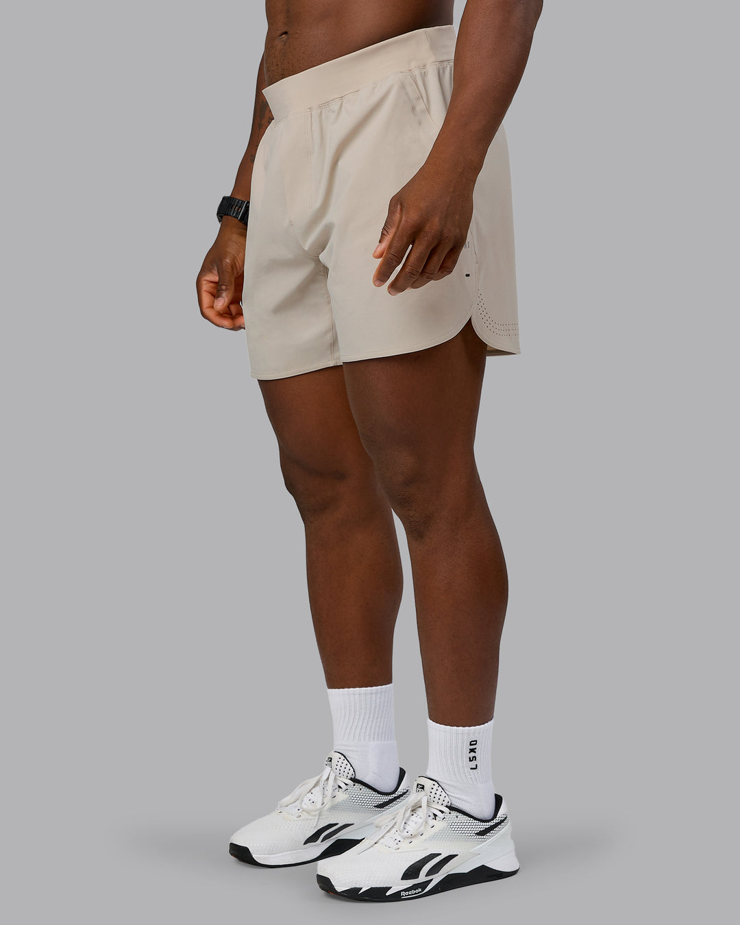 Man wearing Lift 6" Performance Short - Shale-Beige | Model:Sam | Size:L - view 7