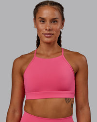 Woman wearing Lift High Neck Sports Bra - Hot Pink | Thumbnail Index: 3