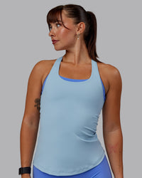 Woman wearing Lift Performance Tank - Glacial Blue | Thumbnail Index: 0