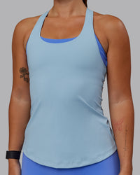 Woman wearing Lift Performance Tank - Glacial Blue | Thumbnail Index: 4